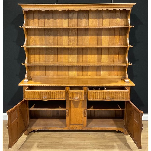 103 - An oak dresser, probably Rupert/Nigel Griffiths Monastic Woodcraft, 192.5cm high, 170cm wide, 42cm d... 