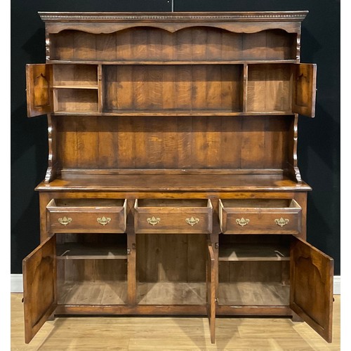 105 - An oak dresser, possibly Titchmarsh & Goodwin, 187.5cm high, 165.5cm wide, 41cm deep