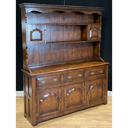 105 - An oak dresser, possibly Titchmarsh & Goodwin, 187.5cm high, 165.5cm wide, 41cm deep