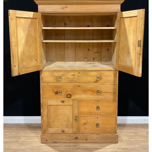 111 - A pine housekeeper’s cupboard, 198.5cm high, 118.5cm wide, 54.5cm deep