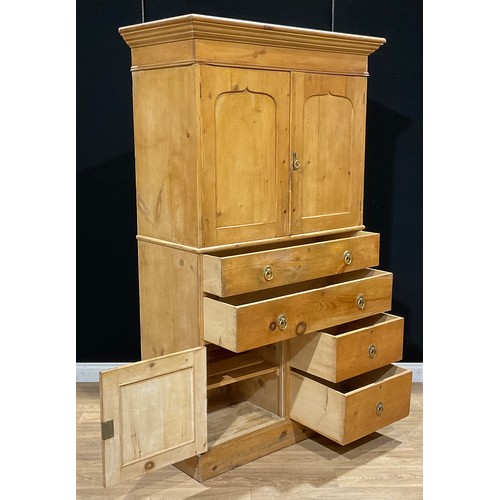 111 - A pine housekeeper’s cupboard, 198.5cm high, 118.5cm wide, 54.5cm deep