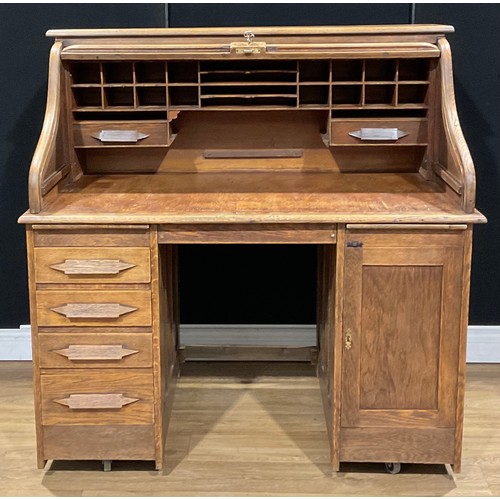 113 - An Art Deco period oak tambour roll top desk, 126cm high, 125cm wide, 76.5cm deep, c.1925