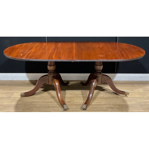 203 - A George III style mahogany twin pedestal dining table, one additional leaf, 69.5cm high, 180.5cm ex... 