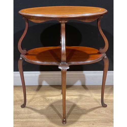 211 - An Edwardian satinwood crossbanded mahogany oval étagère, 71cm high, 58cm wide, 37cm deep, c.1905