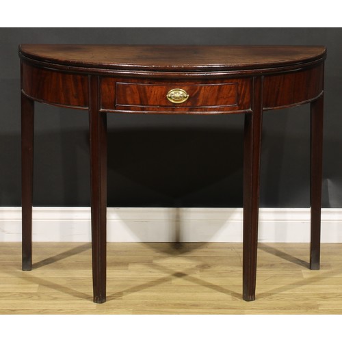 212 - A George III mahogany demilune tea table, hinged top above a single frieze drawer, tapered legs, 73c... 