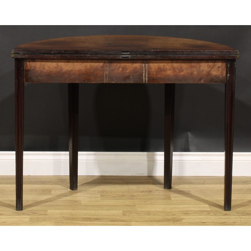 212 - A George III mahogany demilune tea table, hinged top above a single frieze drawer, tapered legs, 73c... 