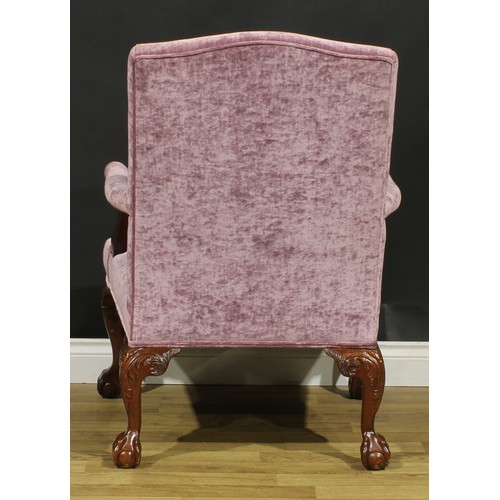 110A - A contemporary George III Revival Gainsborough armchair, 102cm high, 72cm wide, the seat 56cm wide a... 