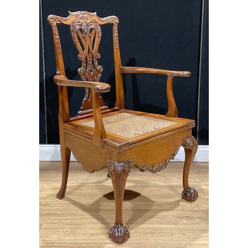 210A - A Chippendale design mahogany commode chair, 108.5cm high, 74cm wide, the seat 54cm wide and 48cm de... 