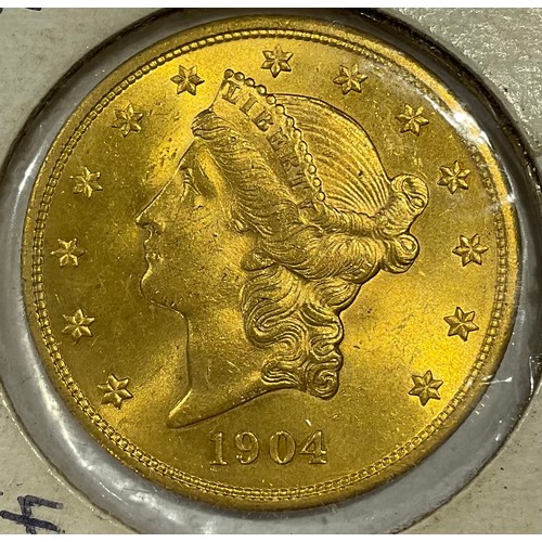 919 - Coins - an American gold $20 coin, eagle and crest, 1904