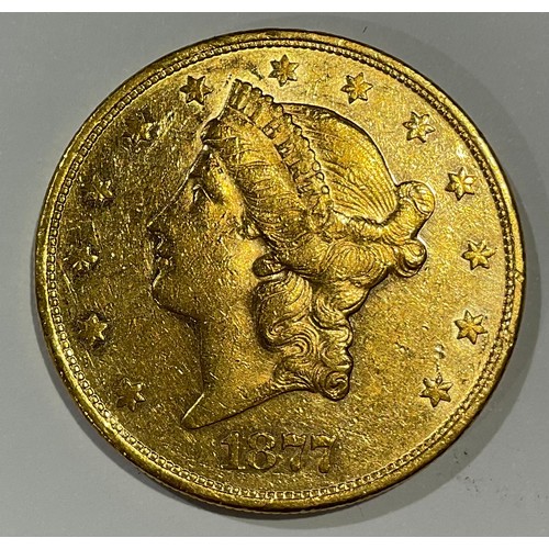 926 - Coins - an American gold $20 coin, eagle and crest, 1877