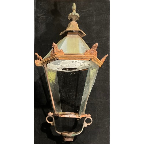 947 - An early 20th century copper and iron street lantern or light, 103cm high