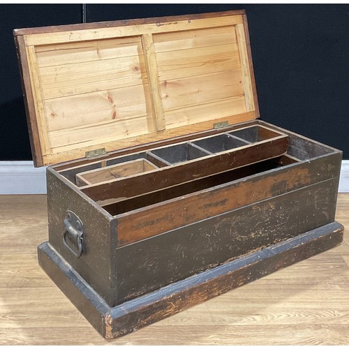 215A - A pine carpenter’s tool chest, hinged top enclosing a compartmented tray, 33.5cm high, 83.5cm wide, ... 