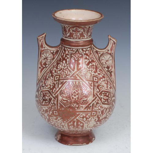 22 - A Middle Eastern lustre vase, decorated in copper lustre in the Islamic taste, 23cm high, 19th centu... 