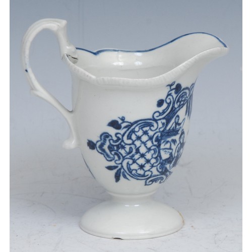 31 - A Christian Liverpool silver shaped milk jug,   painted in underglaze blue with Mother & Child and M... 