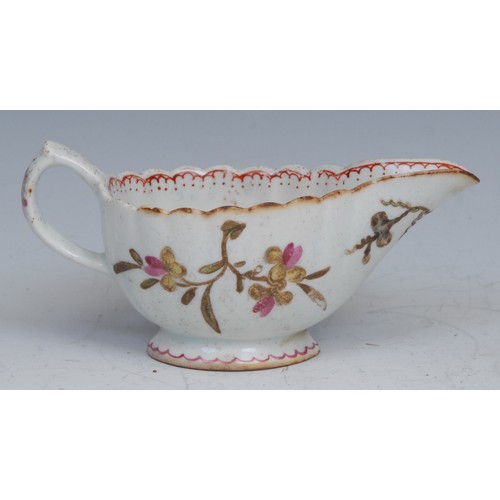 29 - A Bow fluted cream boat, of silver shape, painted in polychrome with flowers, red double-line pendan... 