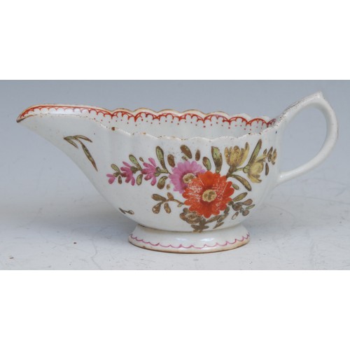 29 - A Bow fluted cream boat, of silver shape, painted in polychrome with flowers, red double-line pendan... 