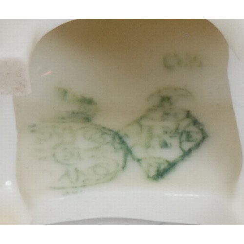 108 - Royal Worcester figure, after James Hadley, of a girl, on a chair, she with hands on her knee, in fl... 