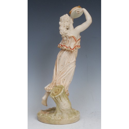 72 - A Royal Worcester figure, after James Hadley, emblematic of music and joy, dancing holding a tambour... 