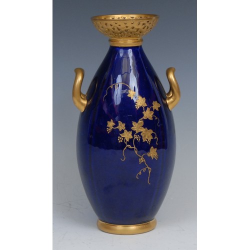 57 - A Grainger Worcester two-handled ovoid vase, painted with a fox hunting scene, in a raised gilt pane... 