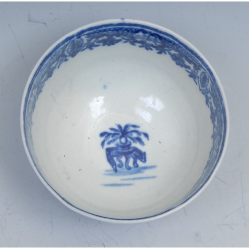 103 - A Worcester Bat pattern tea bowl and saucer, decorated in underglaze blue with a chinoiserie garden,... 