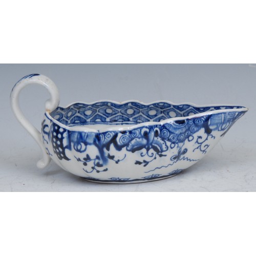 105 - A Worcester lobed ovoid sauceboat, decorated in underglaze blue with Full Moon pattern, cell banded ... 