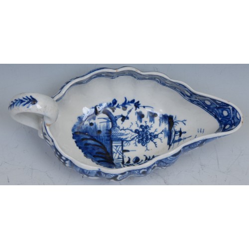105 - A Worcester lobed ovoid sauceboat, decorated in underglaze blue with Full Moon pattern, cell banded ... 