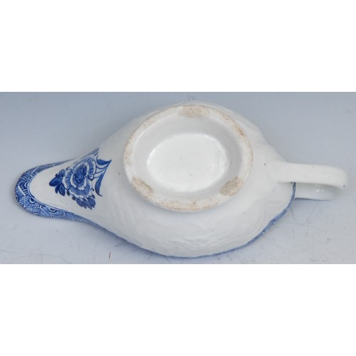 117 - A Derby patch mark sauceboat of unusual shape, moulded with panels of raised flowers surrounded by b... 