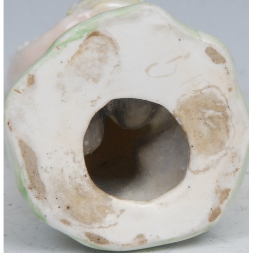 115 - A Derby patch mark figure, Putto, garlanded with flowers, 10cm high, c.1780