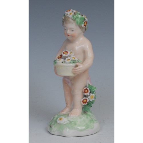 114 - A Derby patch mark figure, Putto, garlanded with flowers, 10cm high, c.1780