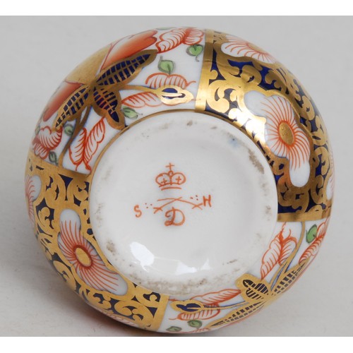 133 - A Sampson Hancock Derby ovoid scent bottle, painted in the Imari palette, 9cm high, red mark; anothe... 
