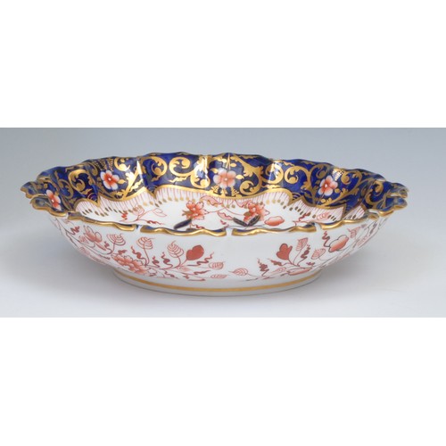 127 - A Royal Crown Derby 3696 Imari pattern shaped octagonal dish, 24cm wide, c.1892; other Royal Crown D... 