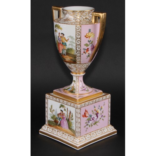 156 - A Dresden porcelain mantel urn, the ovoid vase with angular scroll handles, painted with courting co... 