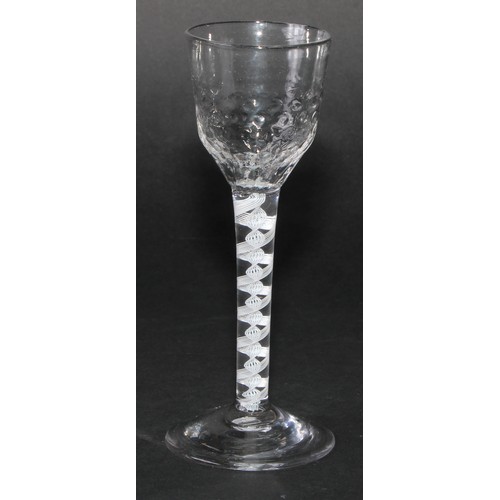 197 - A George III opaque twist drinking glass, moulded bowl, double-helix cotton twist stem, domed circul... 