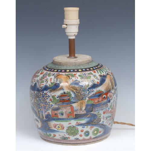 250 - A Chinese ovoid doucai ginger jar, painted with a monumental landscape, clobbered in gilt, 20cm high... 