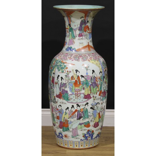 222 - A Chinese famille rose ovoid floor vase, painted in the typical Cantonese manner with ladies of the ... 