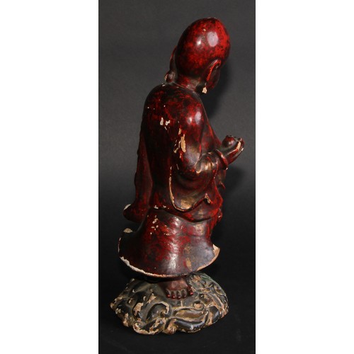 239 - A Chinese cinnabar and polychrome lacquer figure, of Shoulao, holding a peach, 32cm high