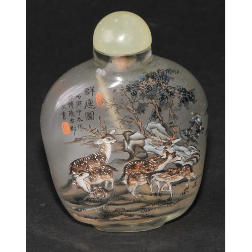 244 - A Chinese inside painted flattened ovoid snuff bottle, decorated with verse, and goats grazing an ou... 