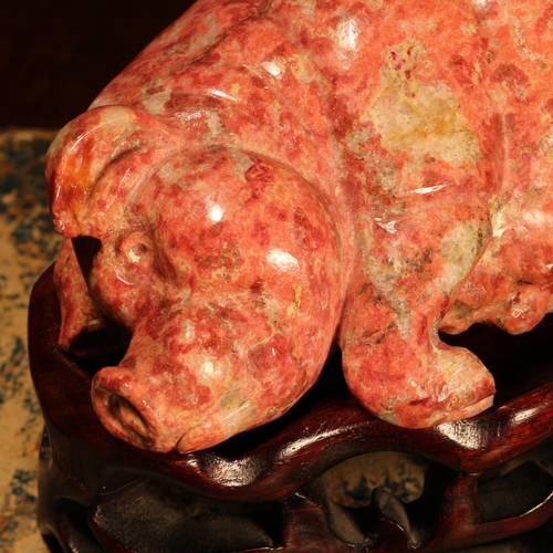241 - A Chinese hardstone carving, of a pig, the sow 15.5cm long, hardwood stand