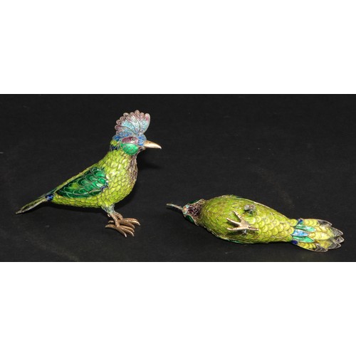 1193 - A pair of Indian silver coloured metal and polychrome enamel models, of exotic birds, 9.5cm long