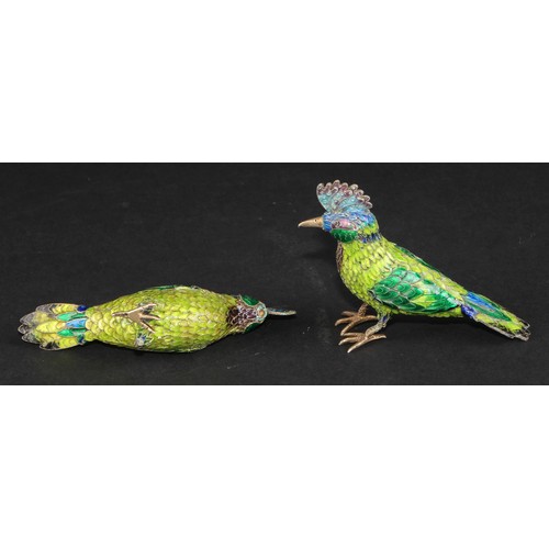 1193 - A pair of Indian silver coloured metal and polychrome enamel models, of exotic birds, 9.5cm long