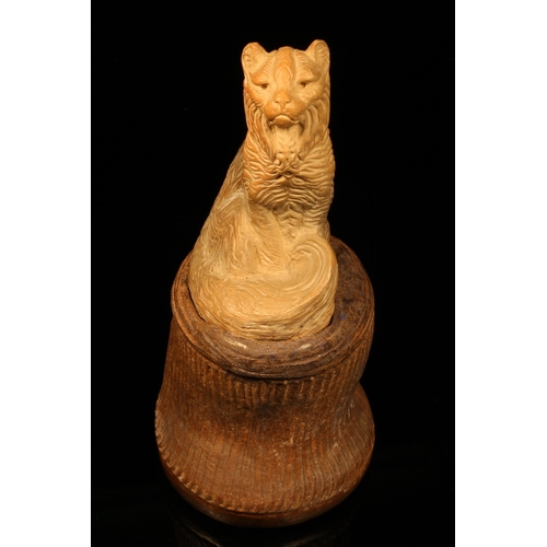 1253 - Alfred Lyndhurst Pocock (1882 - 1962), a terracotta cabinet sculpture, of a cat, seated, 12.5cm high... 