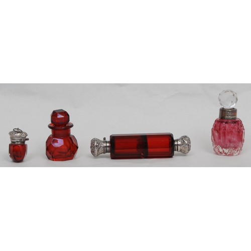 1197 - A Victorian silver mounted ruby glass double-ended scent and smelling salts bottle, the hinged and s... 