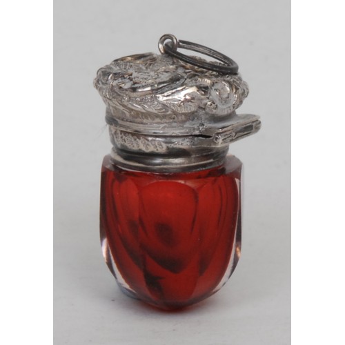 1197 - A Victorian silver mounted ruby glass double-ended scent and smelling salts bottle, the hinged and s... 