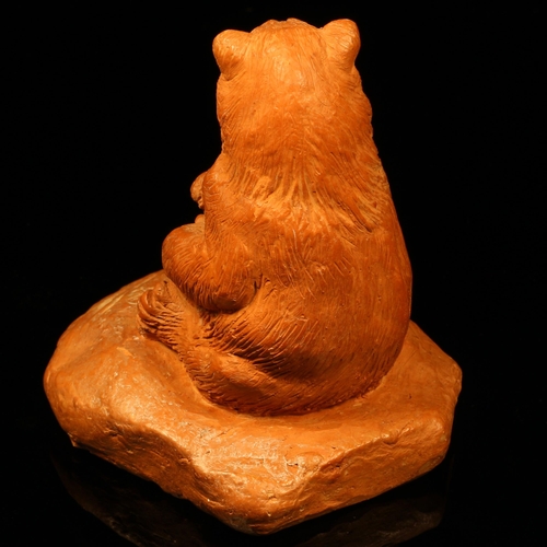 1256 - Alfred Lyndhurst Pocock (1882 - 1962), a terracotta cabinet sculpture, of a seated bear, 8cm high, s... 