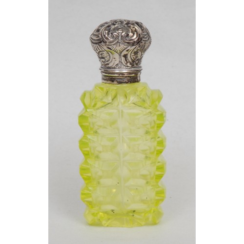 1178 - A 19th century silver coloured metal mounted uranium glass scent bottle, hinged cover embossed with ... 