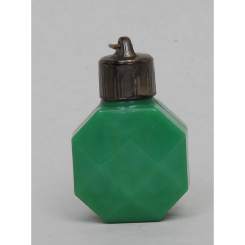 1178 - A 19th century silver coloured metal mounted uranium glass scent bottle, hinged cover embossed with ... 