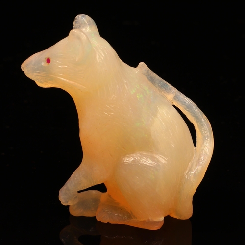 1207 - Alfred Lyndhurst Pocock (1882 - 1962), a chalcedony carving, of a rat, seated upright, gem set eyes,... 