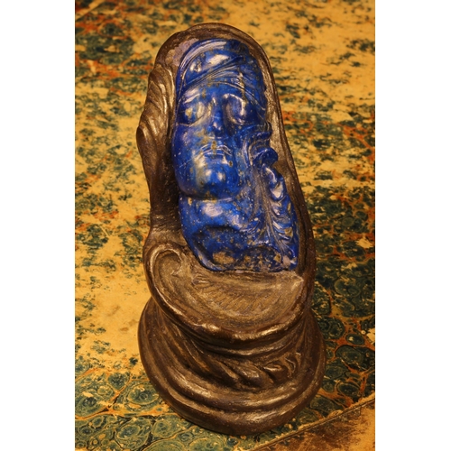 1226 - Alfred Lyndhurst Pocock (1882 - 1962), a lapis lazuli carving, the head a lady, terracotta cradle, u... 