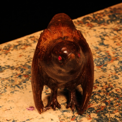 1219 - Alfred Lyndhurst Pocock (1882 - 1962), a hardwood carving, of a bird, ruby eyes, 6cm high, signed