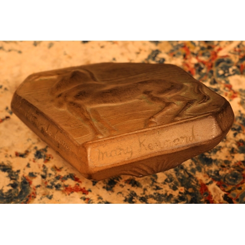 1281 - An Art Deco terracotta buckle, probably by Alfred Lyndhurst Pocock (1882 - 1962), in relief with a h... 